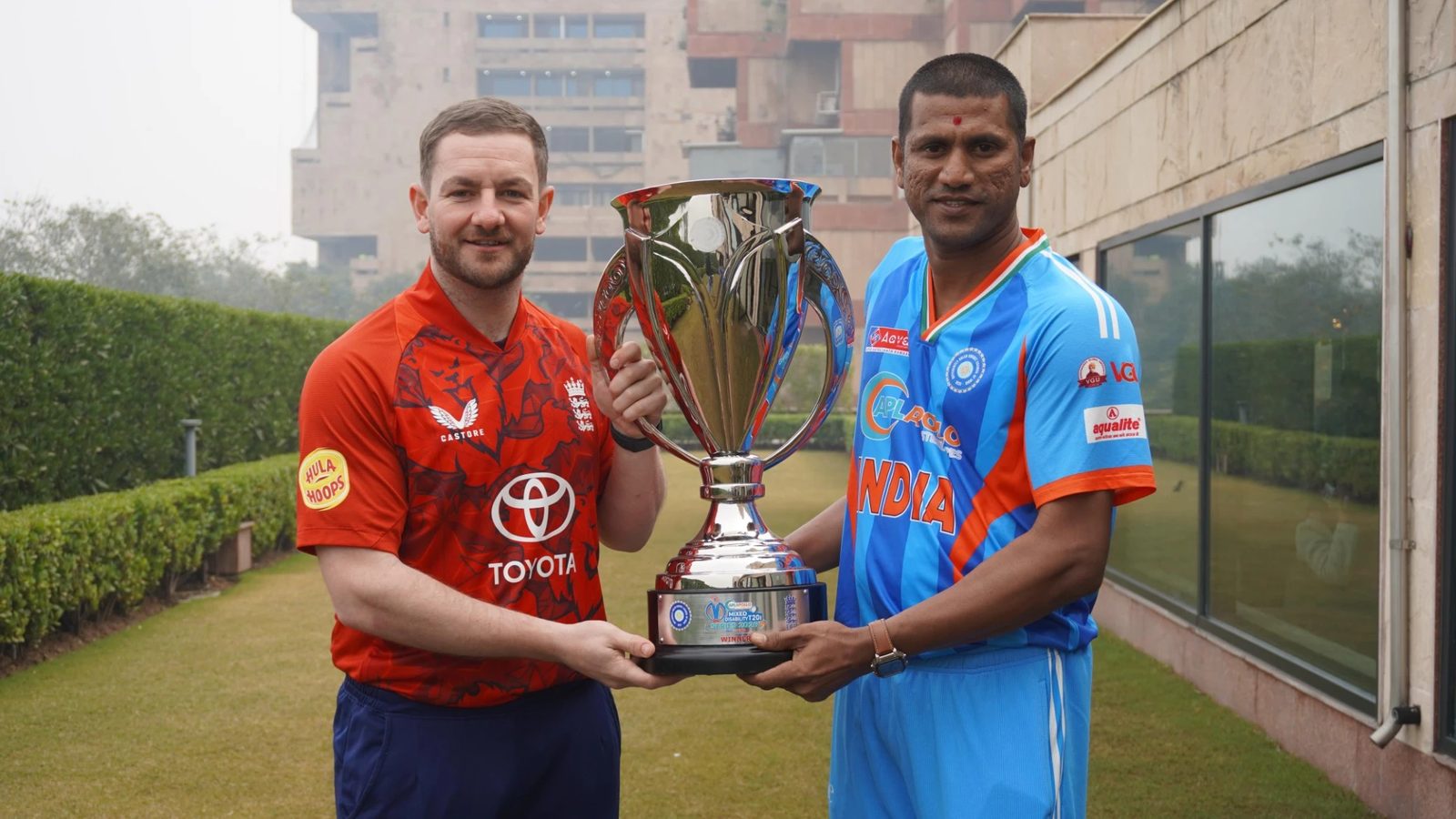 India and England captains with the Mixed Disability Series trophy